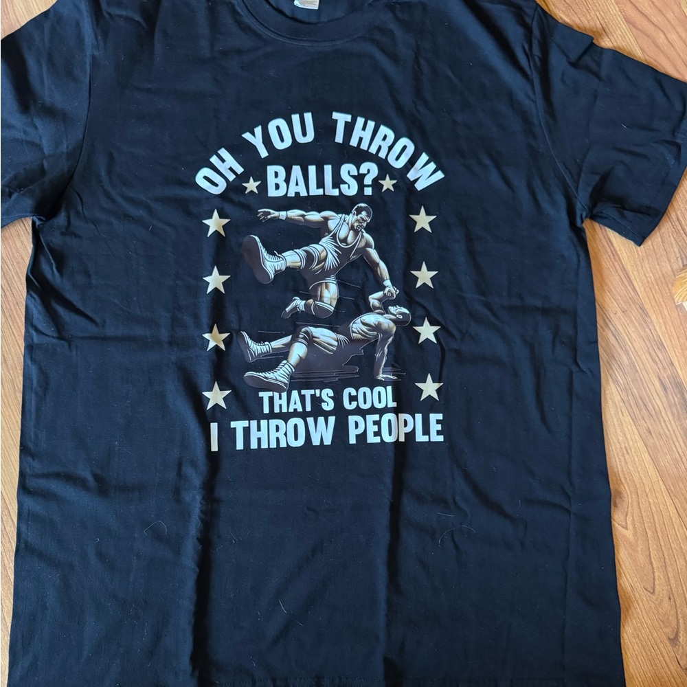 Black Graphic T-Shirt with Wrestling Design